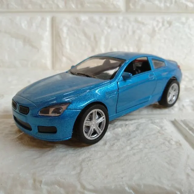 /img/50076-diecast-mercedes-display.webp